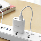 Wall charger “C52 Authority power” dual USB ports US