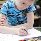 Children painting paper roll