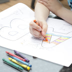 Children painting paper roll