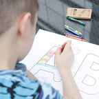 Children painting paper roll