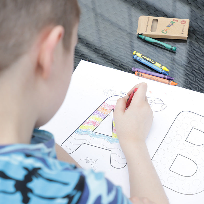 Children painting paper roll